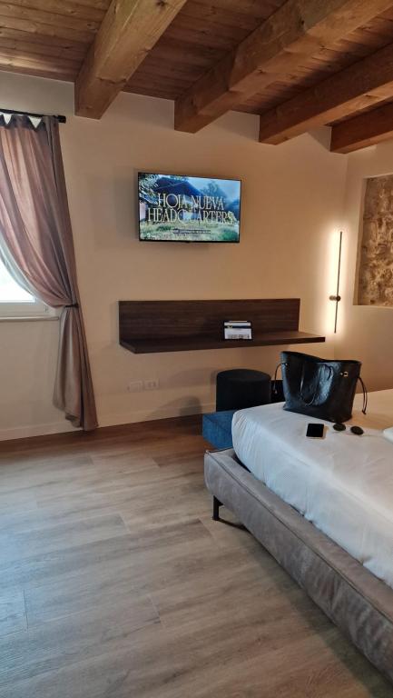 Postel nebo postele na pokoji v ubytování Casa Ossan