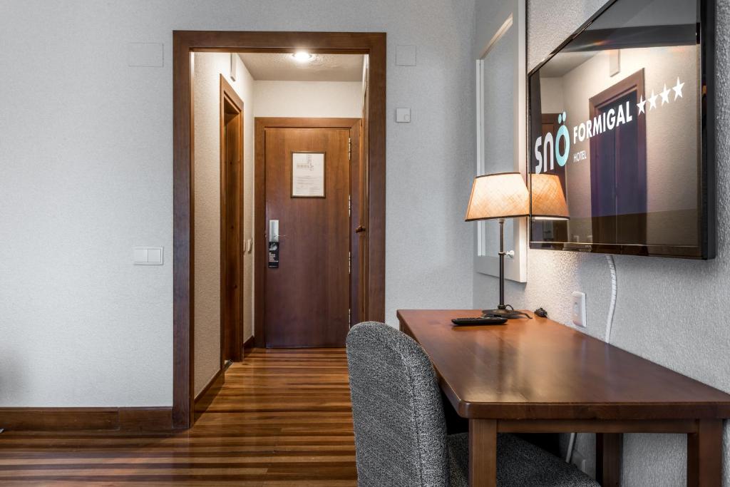 TV a/nebo společenská místnost v ubytování Snö Hotel Formigal