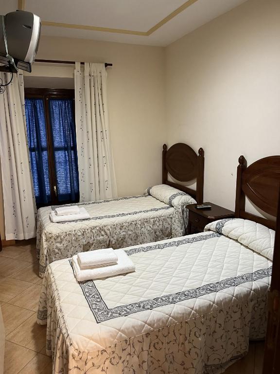 Postel nebo postele na pokoji v ubytování El Carmen