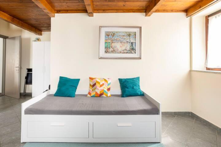 Łóżko lub łóżka w pokoju w obiekcie Hotel Fontaine Bleue