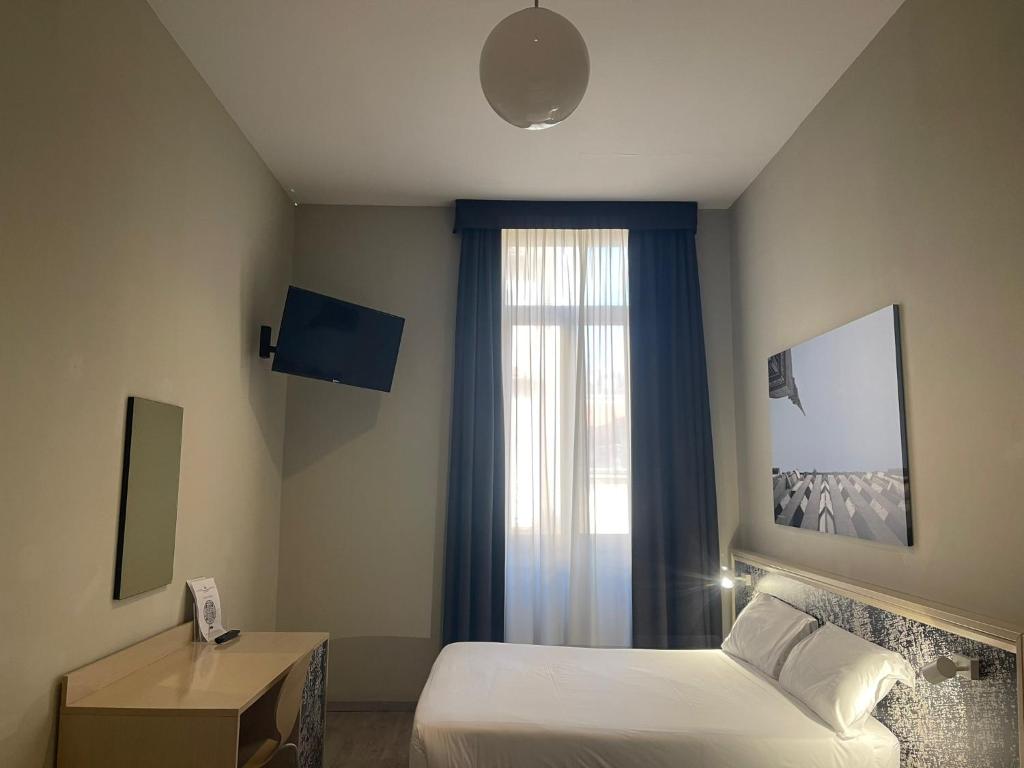 TV a/nebo společenská místnost v ubytování Best Quality Hotel Dock Milano