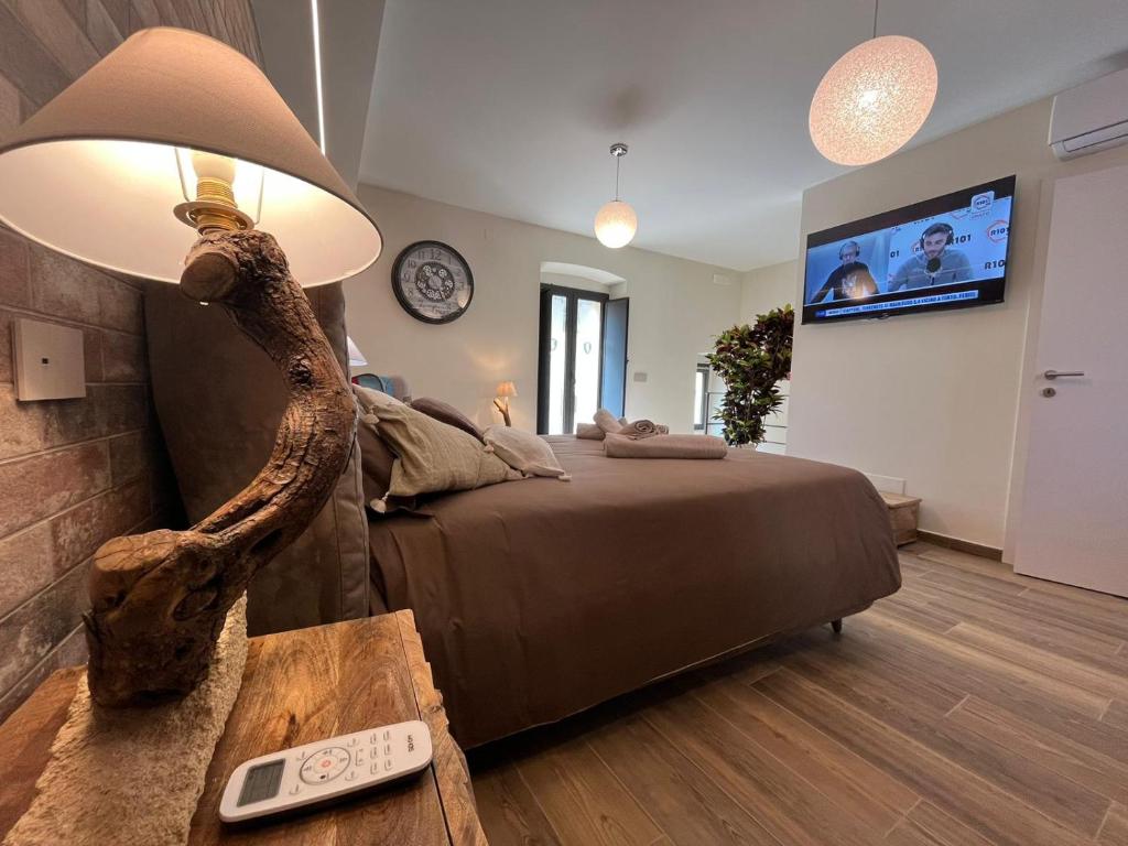 TV a/nebo společenská místnost v ubytování Le Dimore Del Gufo - Royal Suite