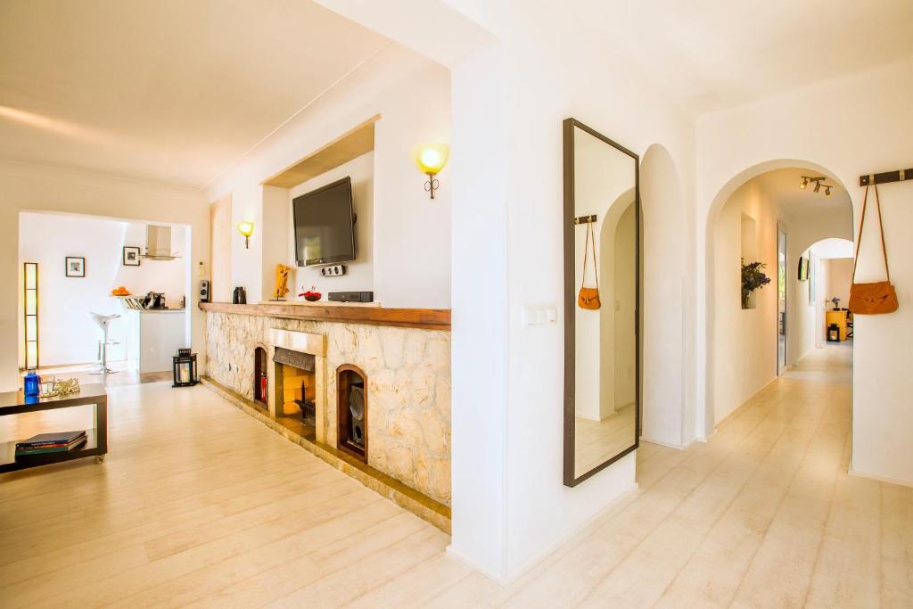 Kuchyň nebo kuchyňský kout v ubytování Casa Pura - Luxuriöses Ferienhaus mit Meerblick
