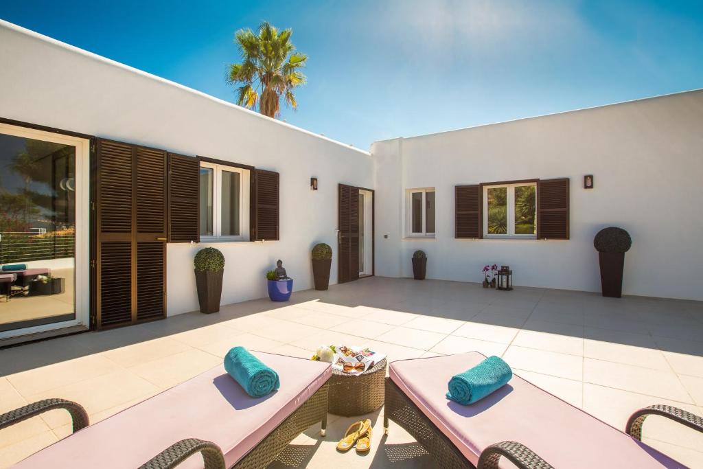 Patio nebo venkovní prostory v ubytování Casa Pura - Luxuriöses Ferienhaus mit Meerblick