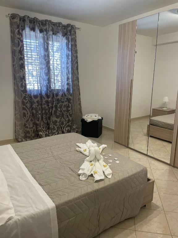 Postel nebo postele na pokoji v ubytování FlorAngè guest house