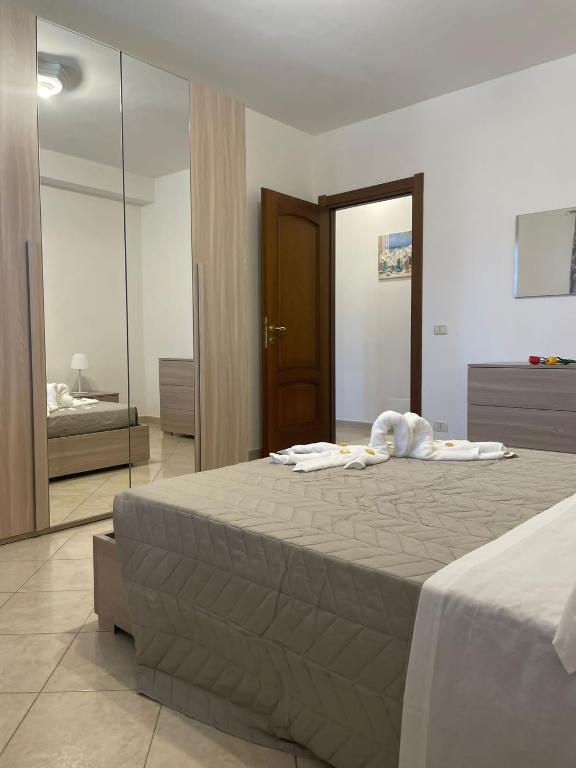 Postel nebo postele na pokoji v ubytování FlorAngè guest house