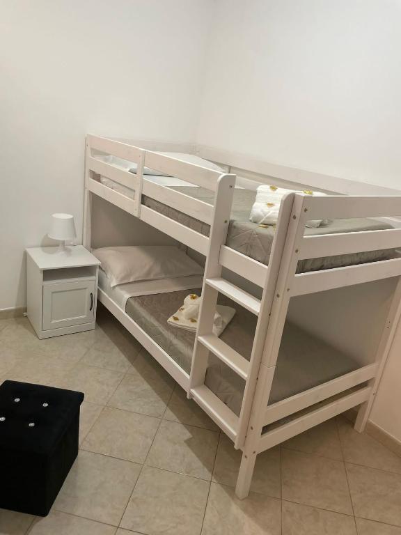 Postel nebo postele na pokoji v ubytování FlorAngè guest house