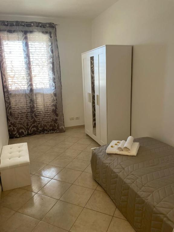 Postel nebo postele na pokoji v ubytování FlorAngè guest house