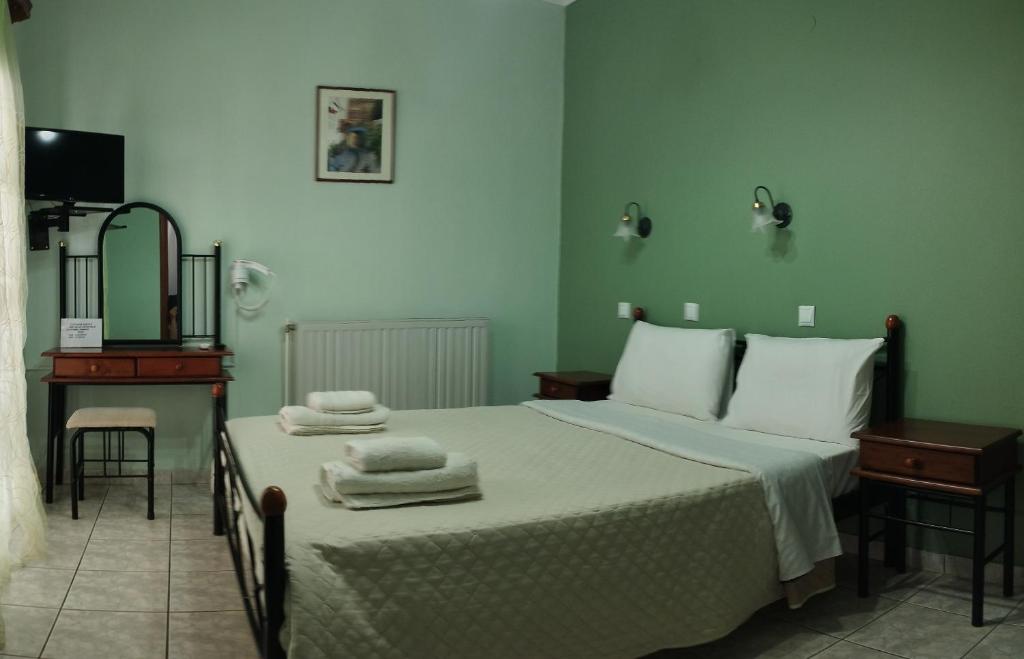 Postel nebo postele na pokoji v ubytování AGNANTIO