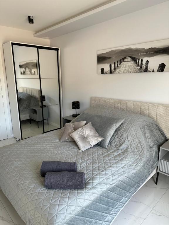 Postel nebo postele na pokoji v ubytování GLAMROOM Mechelinki