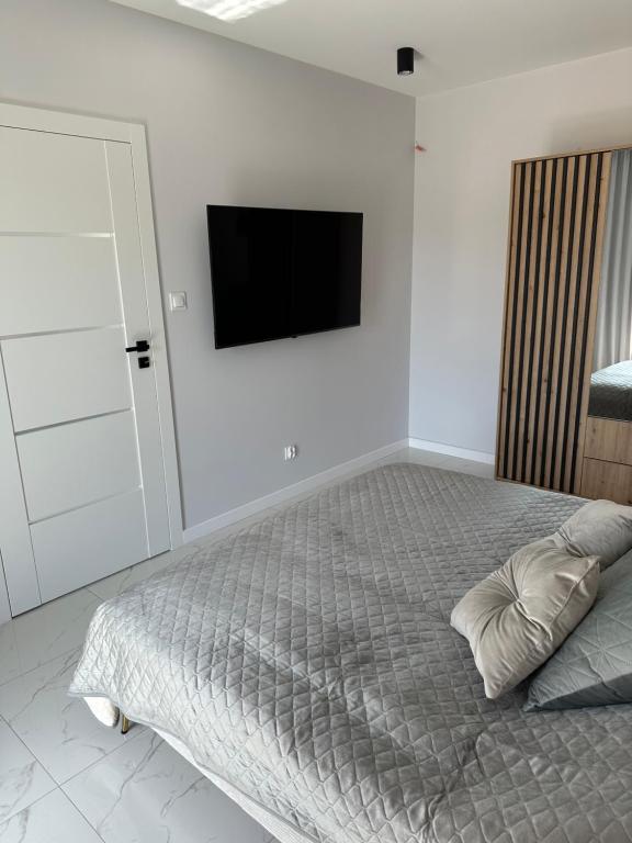Postel nebo postele na pokoji v ubytování GLAMROOM Mechelinki