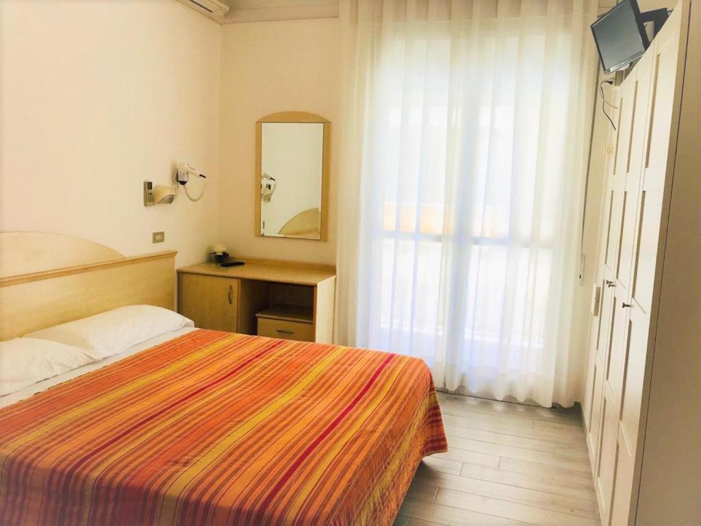 Postel nebo postele na pokoji v ubytování Park Hotel Pineta
