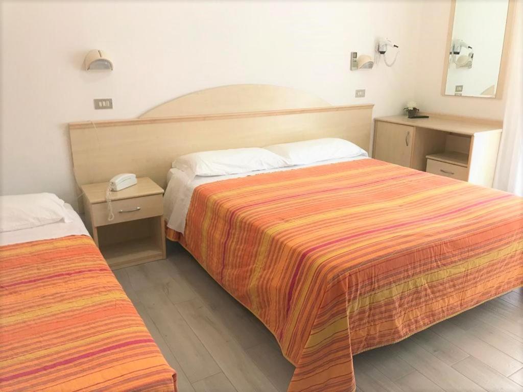 Postel nebo postele na pokoji v ubytování Park Hotel Pineta