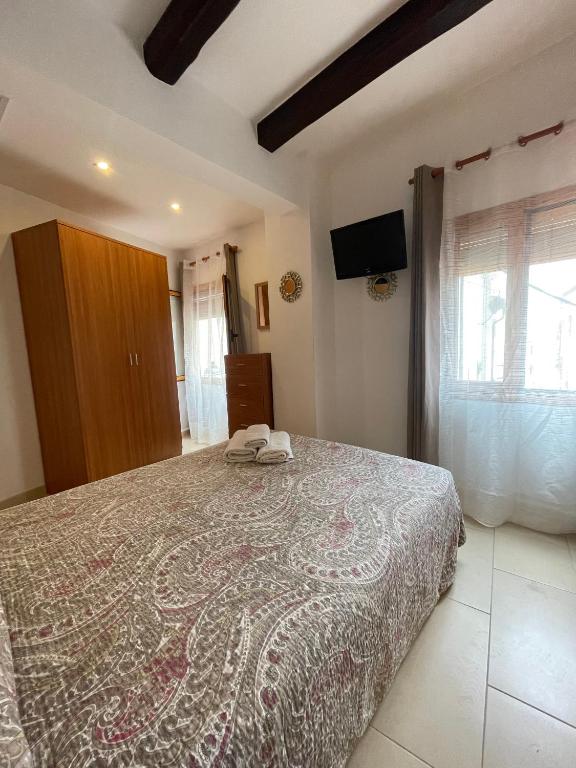 Cama o camas de una habitación en P&R hostals Codolar