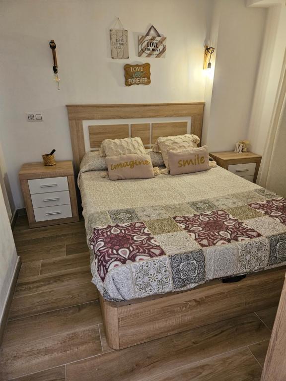 A bed or beds in a room at "Corner of happiness"