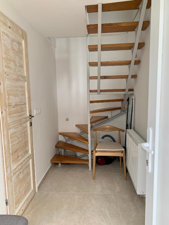 Postel nebo postele na pokoji v ubytování Nono Apartman Bükfürdő