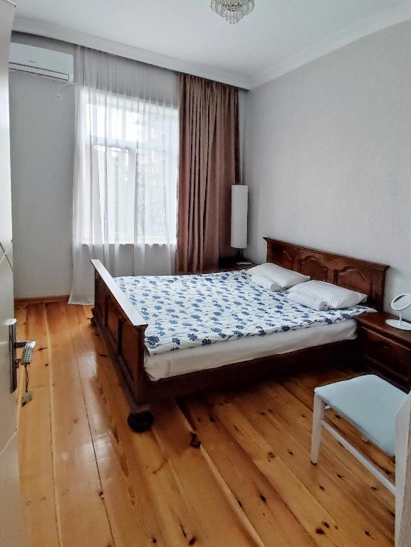Llit o llits en una habitació de Friendly Guest House