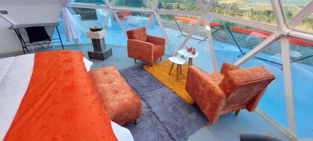 Posezení v ubytování Monarca Azul Glamping