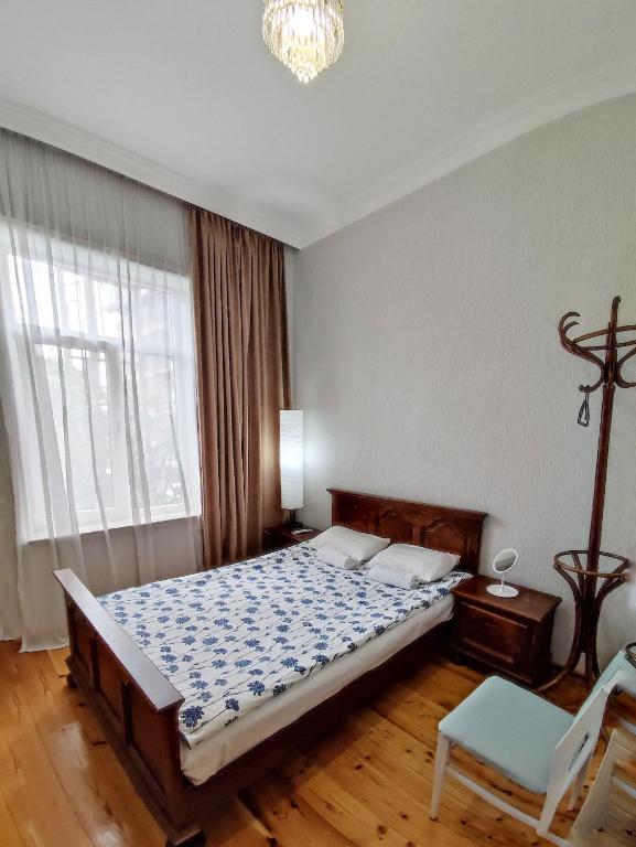 Llit o llits en una habitació de Friendly Guest House