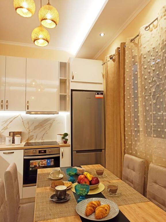 Kuchyň nebo kuchyňský kout v ubytování Elmar Apartment