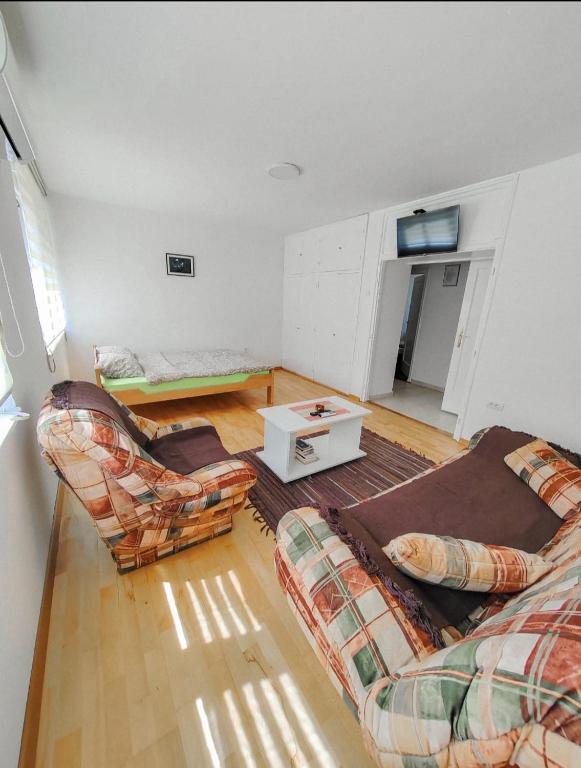 Postel nebo postele na pokoji v ubytování Apartman Mali Raj Rudnik II