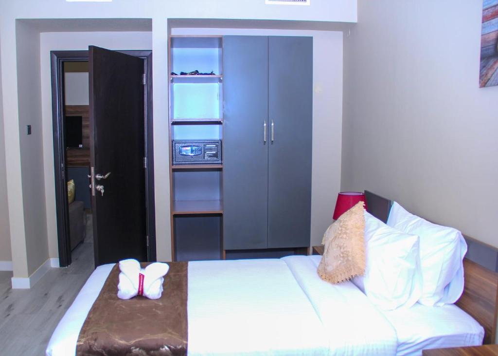 Postel nebo postele na pokoji v ubytování The Saj Hotel