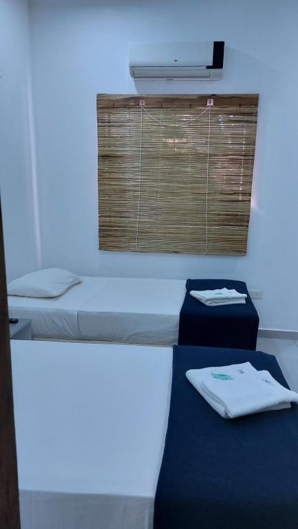 Postel nebo postele na pokoji v ubytování Casa de Mia