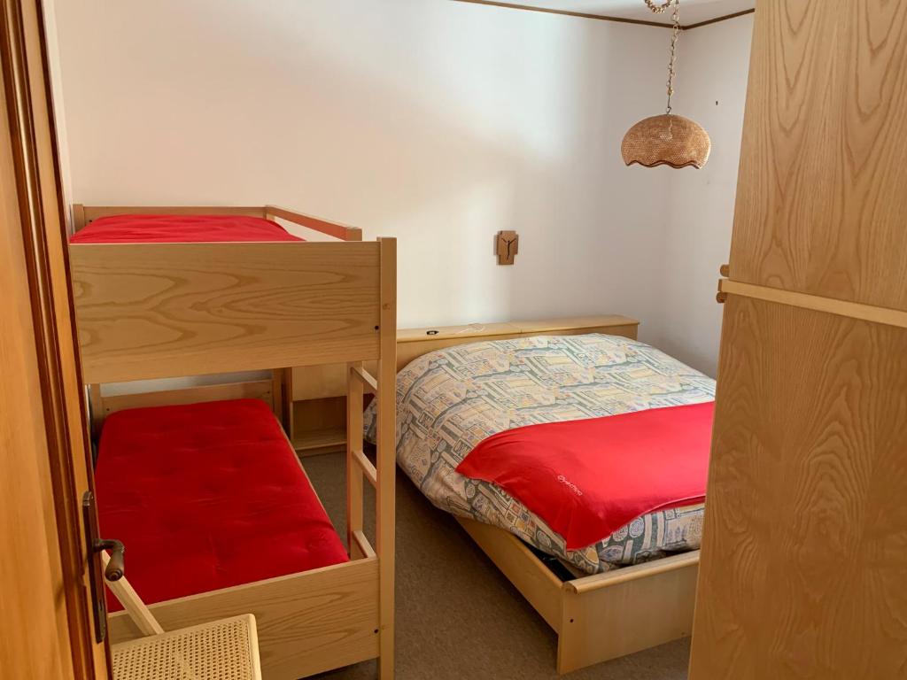 Postel nebo postele na pokoji v ubytování Bielmonte Appartamenti