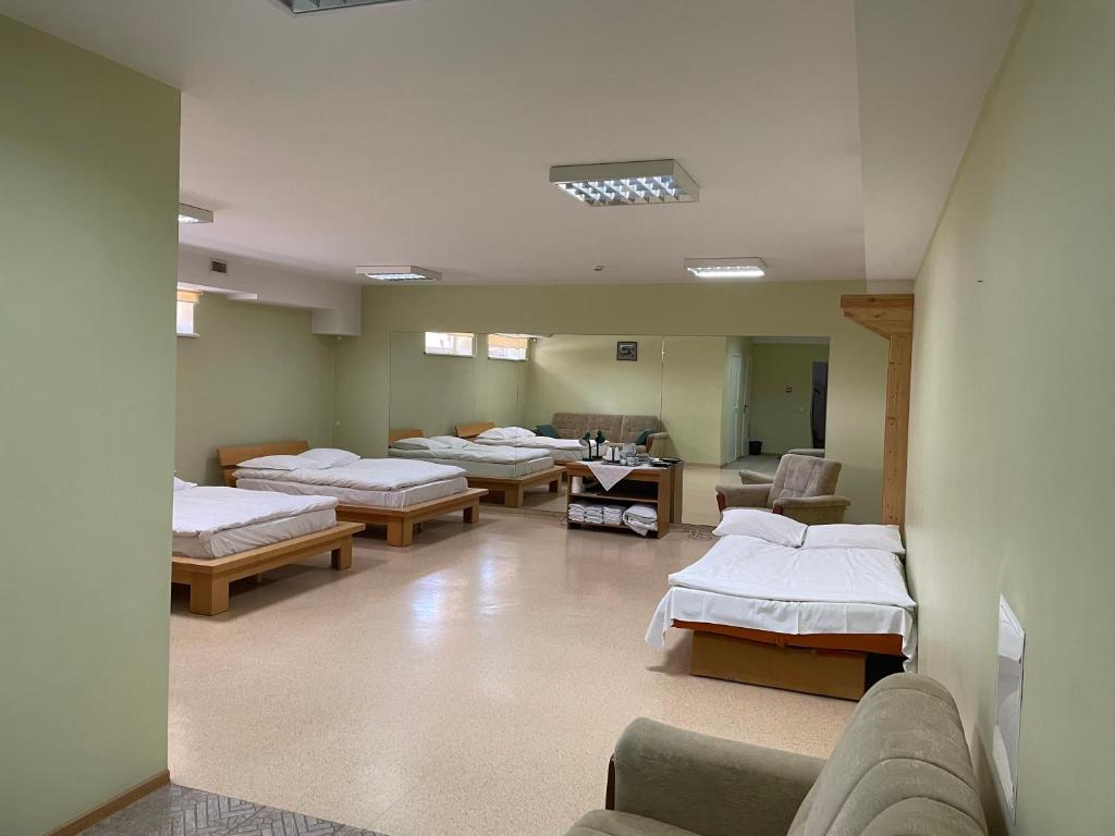 Postel nebo postele na pokoji v ubytování Aismares Hostel
