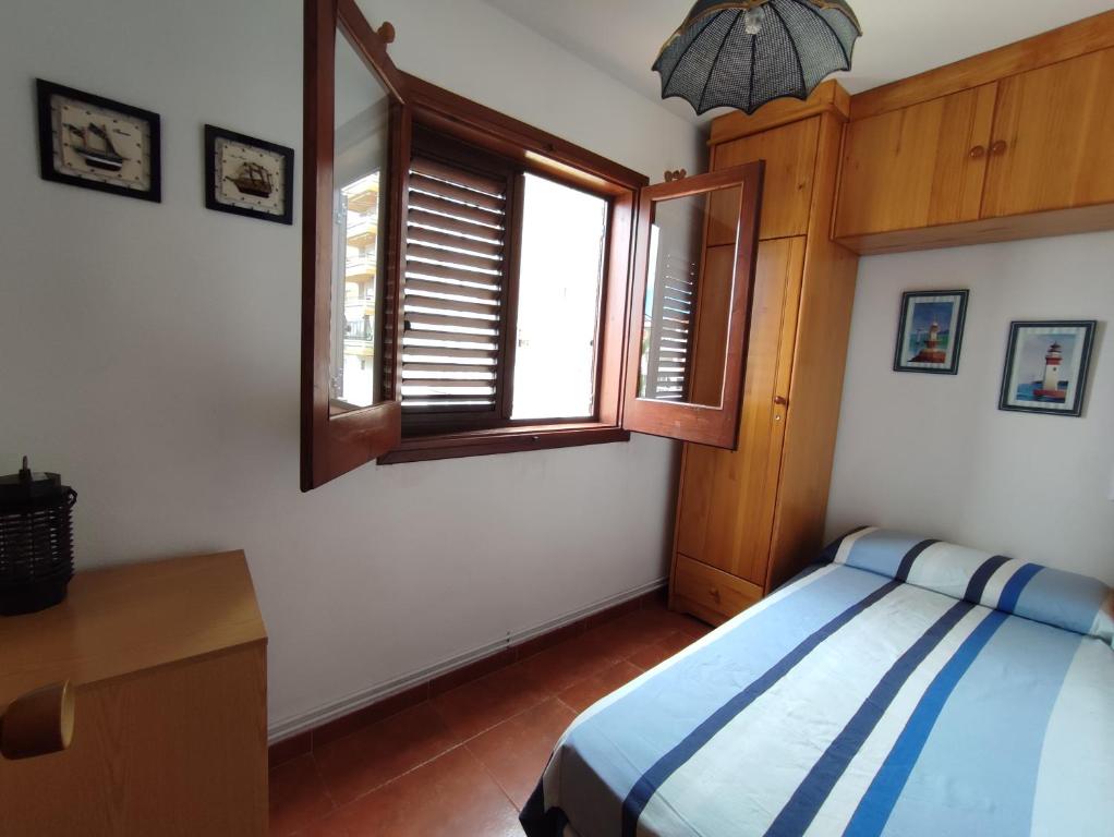 Postel nebo postele na pokoji v ubytování APCOSTAS Villa Ibiza - Oropesa