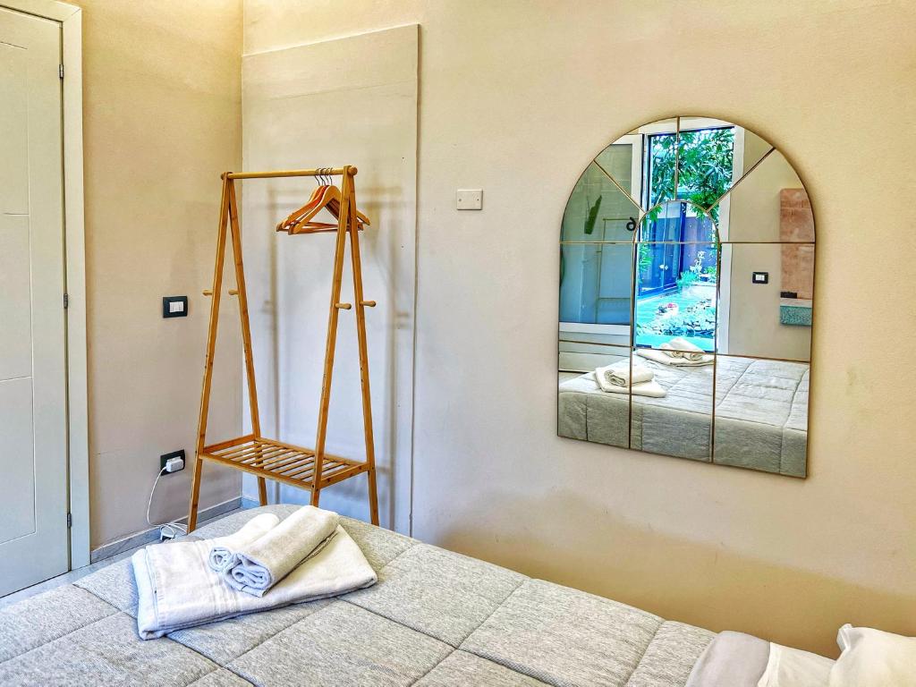 Postel nebo postele na pokoji v ubytování A CASA DI MARIANNA