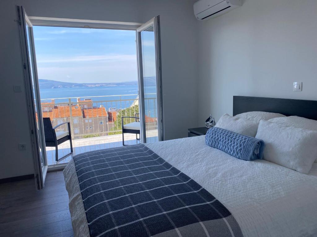 En eller flere senge i et værelse på Apartman Vieler Sterne