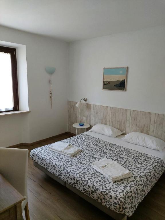 Postel nebo postele na pokoji v ubytování B&B Isa