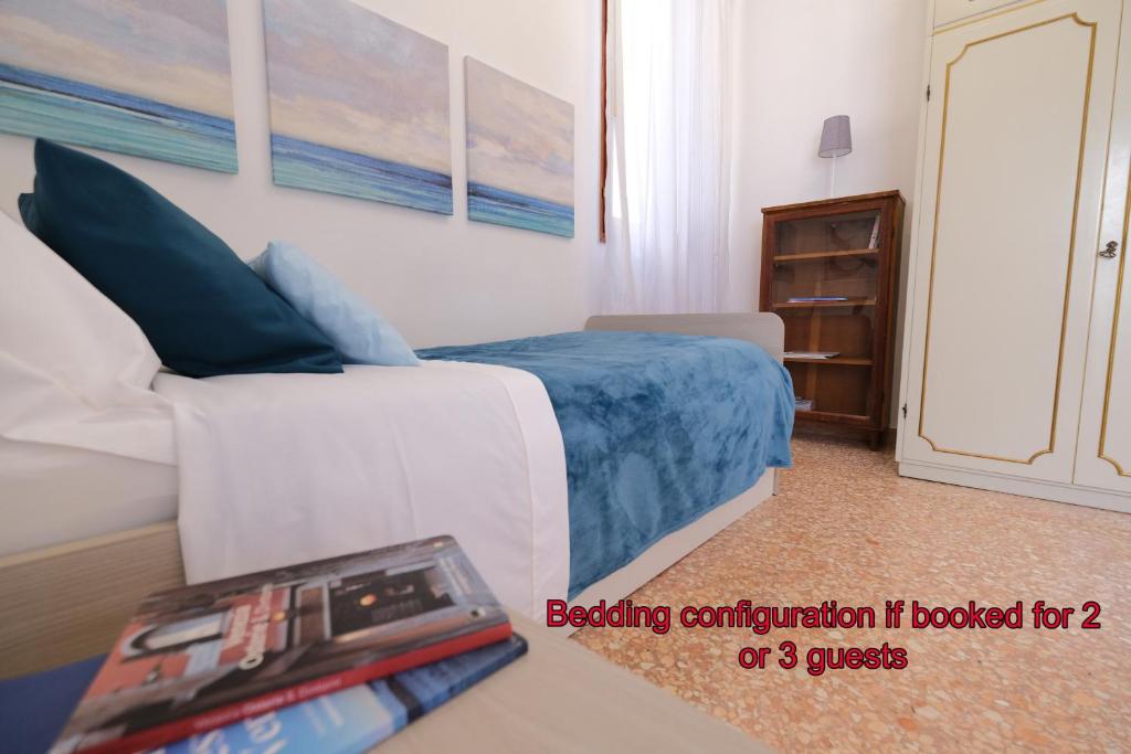 A bed or beds in a room at Venice Life