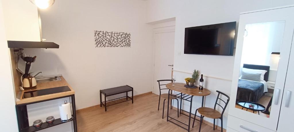 TV a/nebo společenská místnost v ubytování Rooms Diana