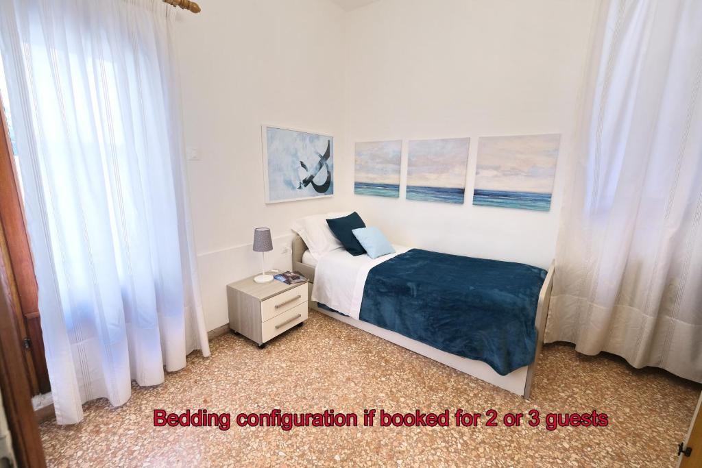 A bed or beds in a room at Venice Life