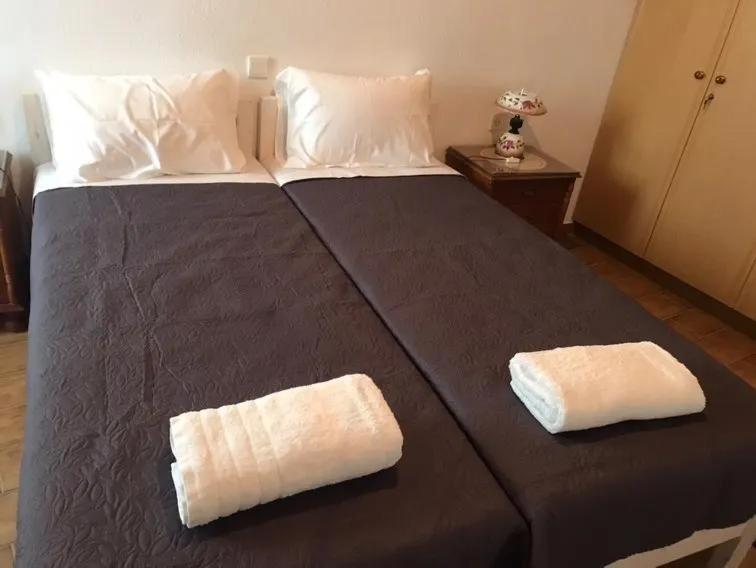Posteľ alebo postele v izbe v ubytovaní Sole Mykonos
