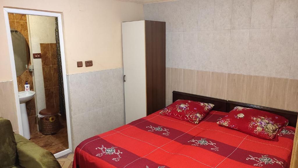 Postel nebo postele na pokoji v ubytování Guesthouse in Batumi 97