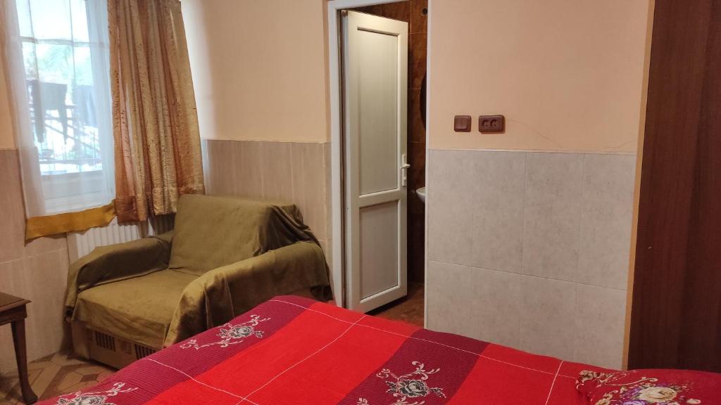 Postel nebo postele na pokoji v ubytování Guesthouse in Batumi 97