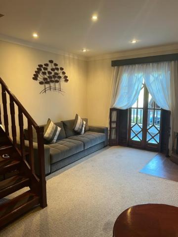 Et opholdsområde på FLAT CASTELO NAS MONTANHAS