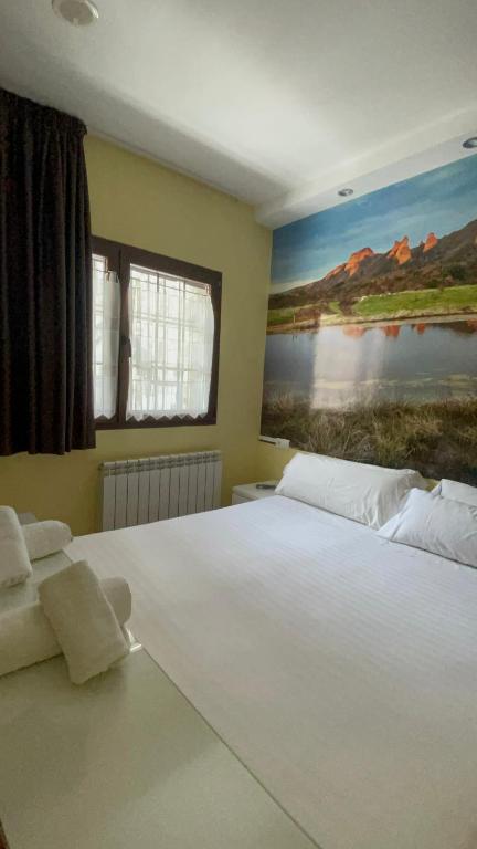 Postel nebo postele na pokoji v ubytování The Way Hotel Molinaseca