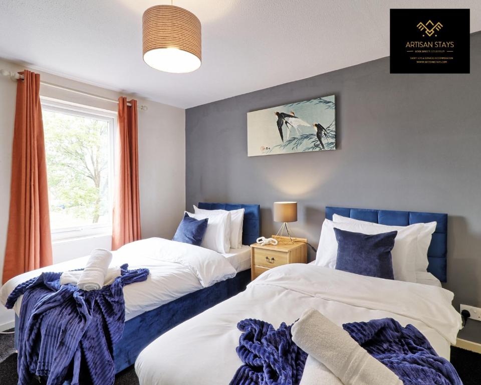 Ένα ή περισσότερα κρεβάτια σε δωμάτιο στο The Gem of Basildon By Artisan Stays I Weekly or Monthly Stay I Relocation & Business