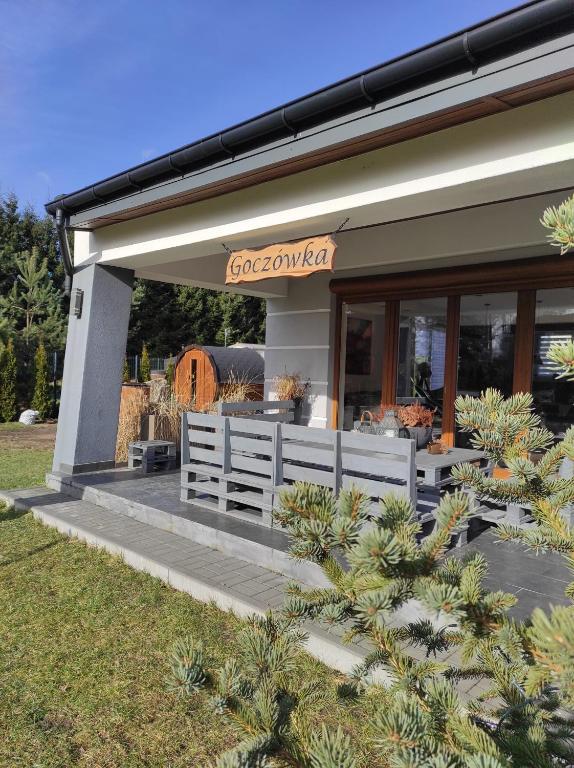 a building with a sign on the front of it at GOCZÓWKA in Siemiany