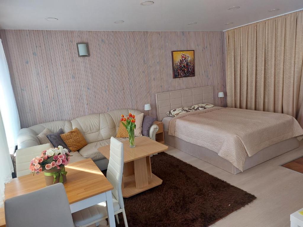 Postel nebo postele na pokoji v ubytování Nida guesthouse at Loreta