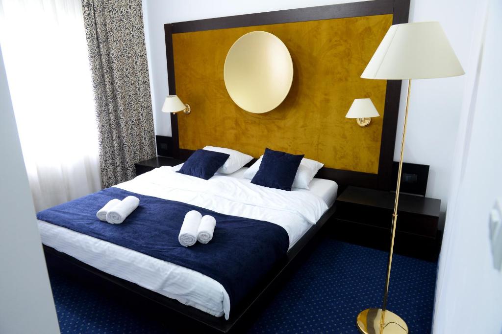 Postel nebo postele na pokoji v ubytování Apartments 29