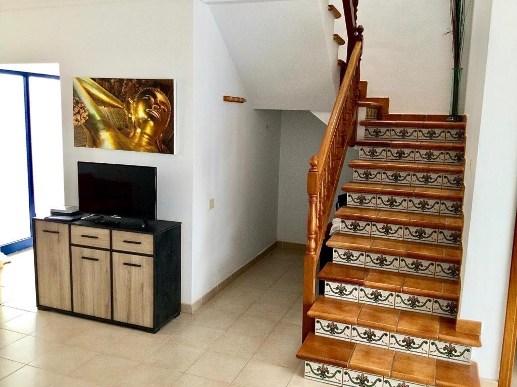 TV a/nebo společenská místnost v ubytování Villa Pura Vida