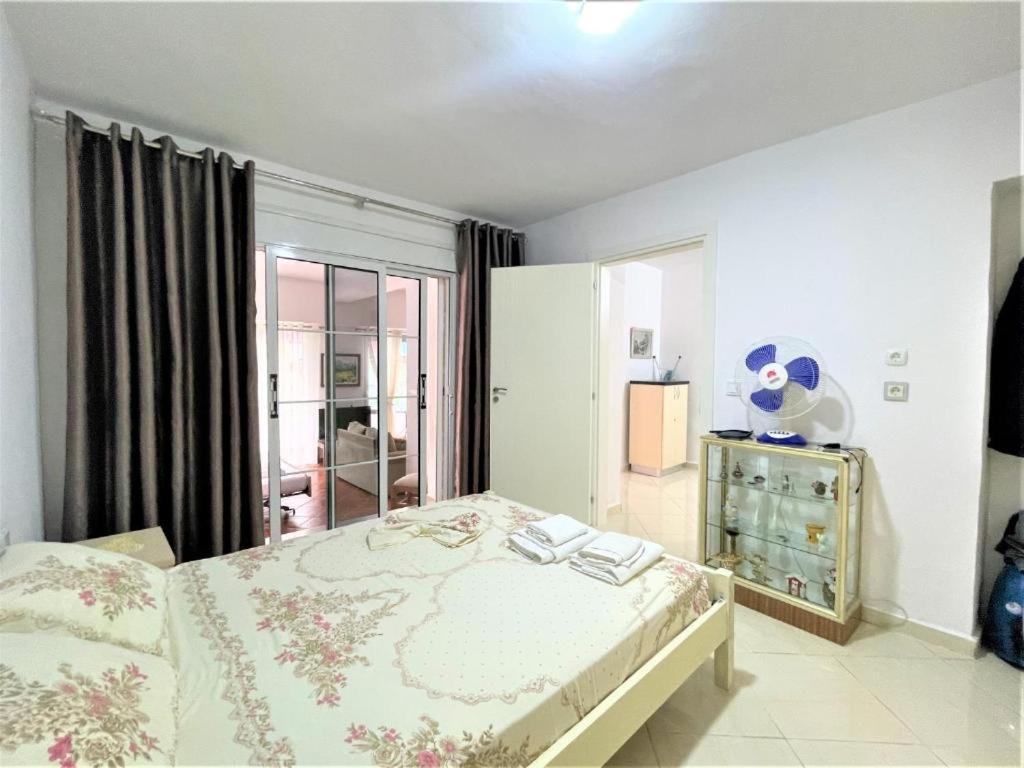 Postel nebo postele na pokoji v ubytování BrunAri Apartment