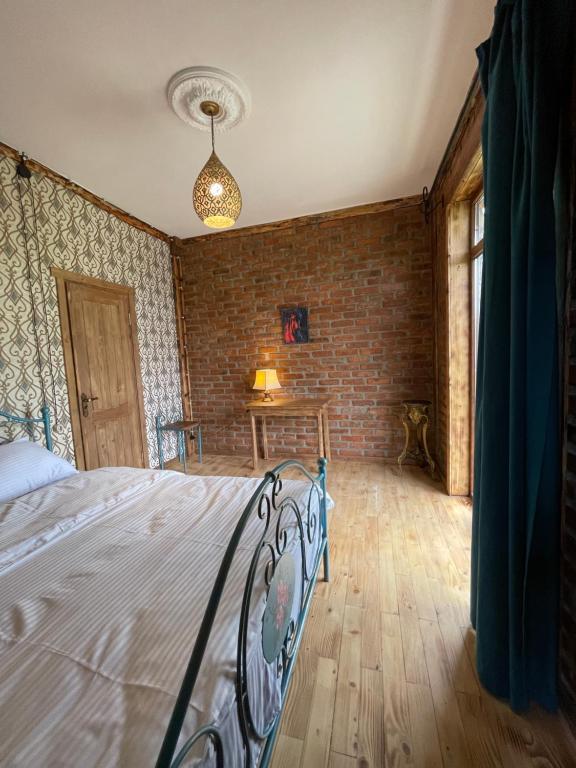 Postel nebo postele na pokoji v ubytování Odo’s Guest House