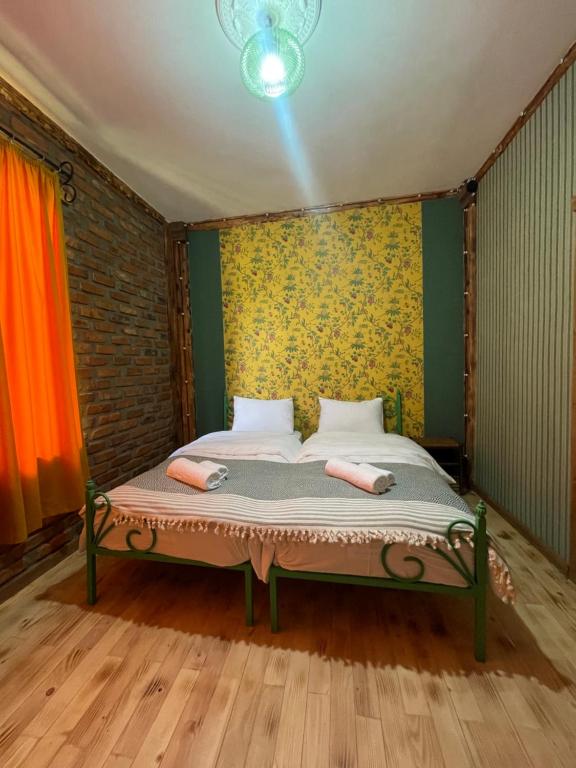 Postel nebo postele na pokoji v ubytování Odo’s Guest House