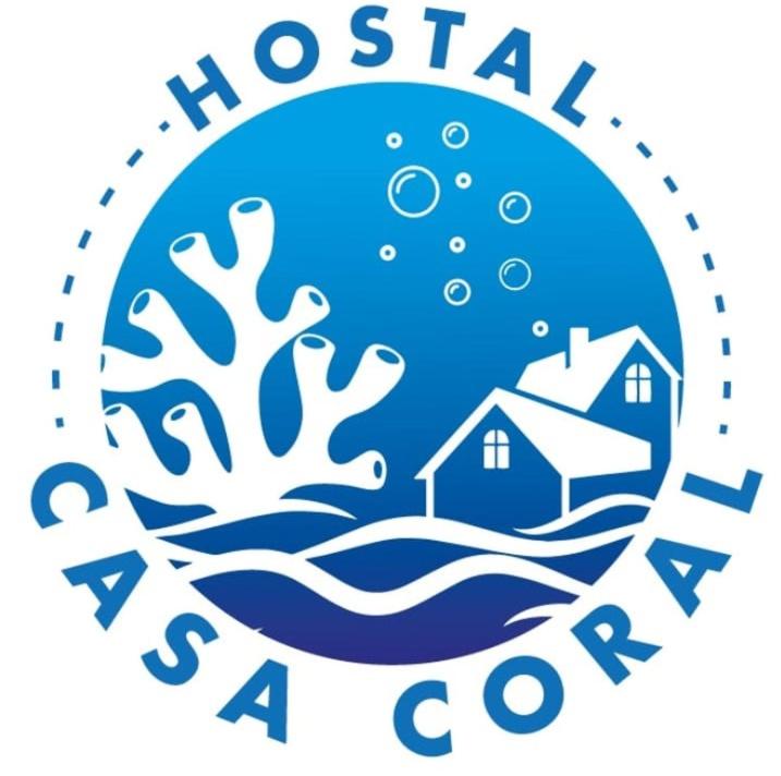 a logo for a resort with houses and trees at casa coral in Bogotá
